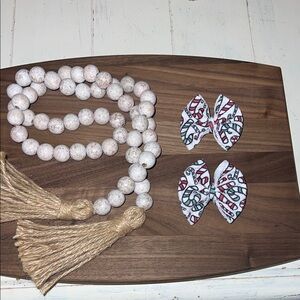 Red and green candy cane hair bows on alligator clips